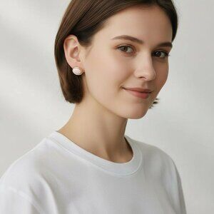 Vintage 1950s–1960s Crown Trifari Pink Lucite Jelly Belly Clip-On Earrings.